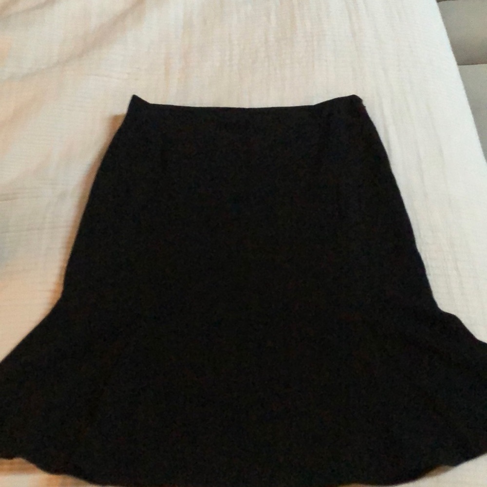 Black wool skirt with flare at hem